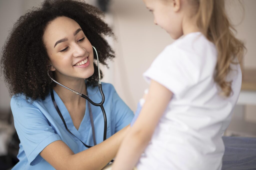 young-doctor-making-sure-little-girl-is-fine-after-vaccination
